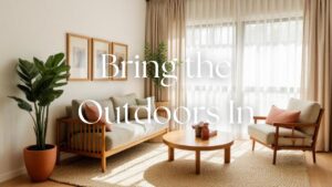A bright, plant-filled rental living room with a wooden coffee table, woven basket, sheer linen curtains, and soft natural light from a nearby window